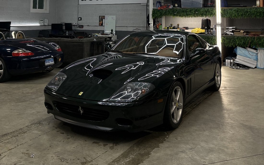 Ferrari 575M under the studio lighting after a 10-year ceramic coating at DetailHaus